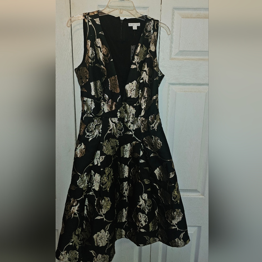 Black and gold knee length party dress